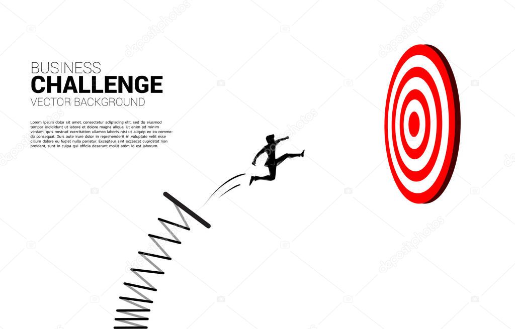 silhouette of businessman jumping to target dartboard with springboard,. Business Concept of targeting and customer.route to success.