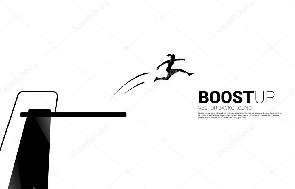 Silhouette of businesswoman jump higher with springboard. Concept of boost and growth in business.