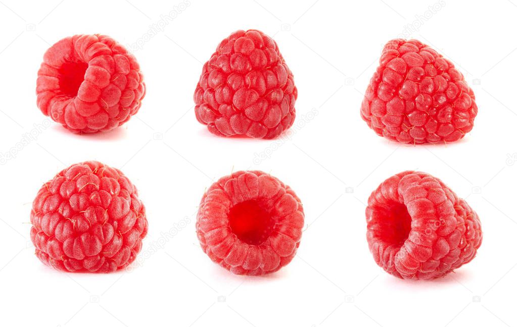 Ripe red fresh raspberries with green leaf isolated on white background. top view. Raspberries closeup macro. Collection