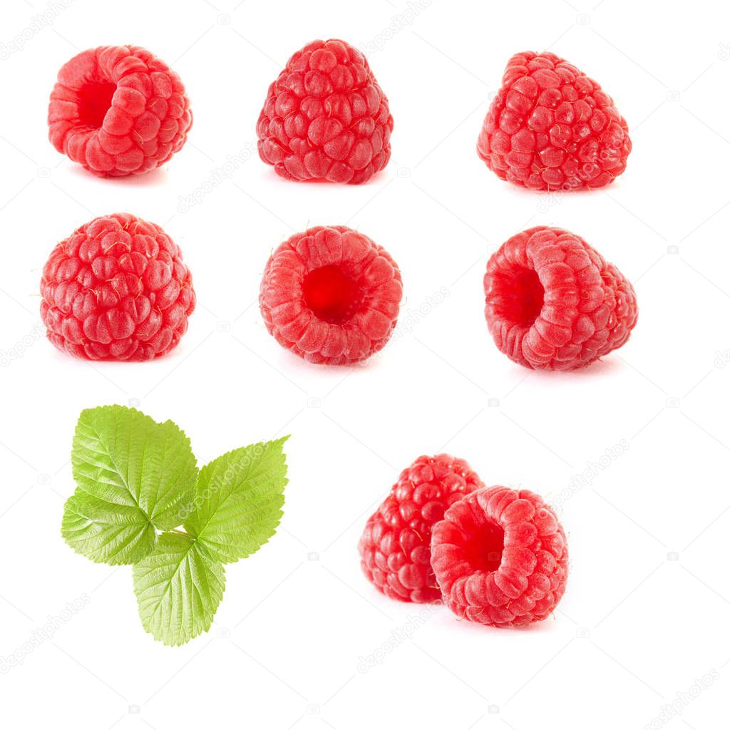 Ripe red fresh raspberries with green leaf isolated on white background. top view. Raspberries closeup macro. Collection