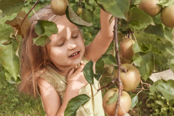 Little Girl Closed Eyes Stands Apple Tree Holding Branch — Stock Photo, Image