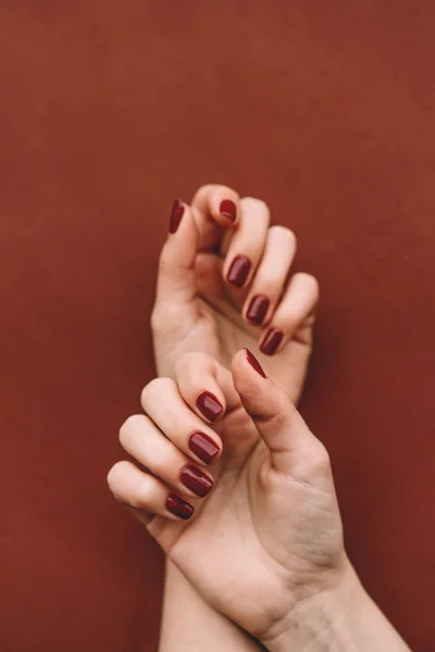 manicure hands with nail polish