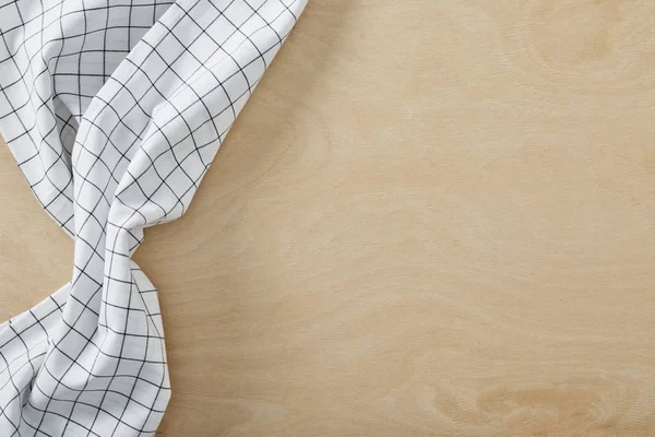 Textilzellenserviette auf Holztisch mit Kopierraum — Stockfoto