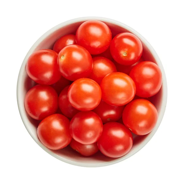 Fresh ripe tomatoes in ceramic bowl isolated on white background. Ingredients for cooking. Top view. — Stock Photo, Image