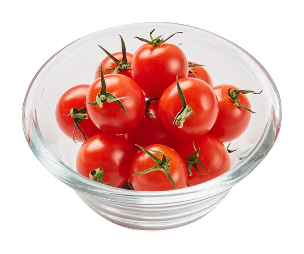 Fresh ripe tomatoes in glass bowl isolated on white background with green leaf. Ingredients for cooking. Top view. — Stock Photo, Image