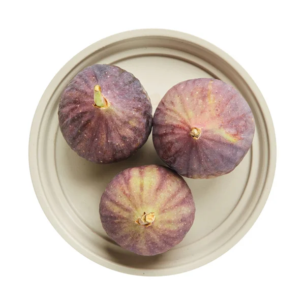 Fresh raw ripe figs in ceramic plate isolated on white background. Ingredients for cooking. Top view. — Stock Photo, Image