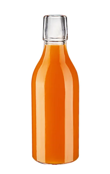 Glass bottle of carrot juice isolated on white background. — Stock Photo, Image