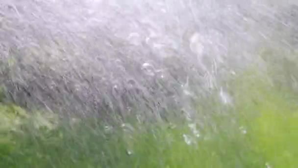 Water jet. Flying drops. Slow motion. — Stock Video