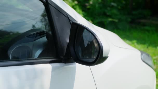 Fold the white car side mirror. Close up — Stock Video