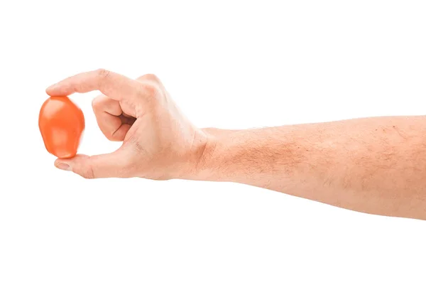 Tomates cereza aislados en blanco con mano masculina — Foto de Stock