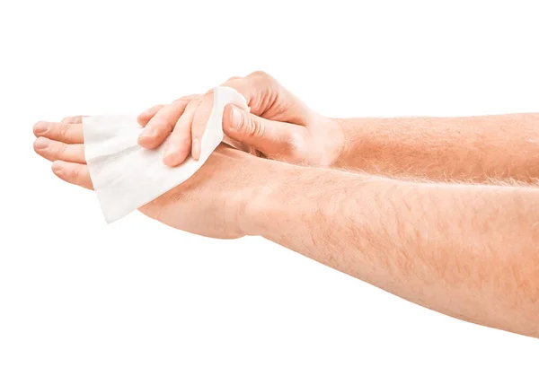 Hombre limpiando su mano con tejido húmedo aislado sobre fondo blanco — Foto de Stock