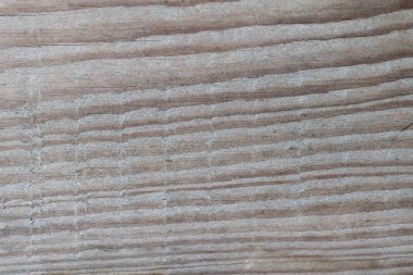 çatlaklar, düğümler ve pürüzlü bir yüzey ile bir tahta şeklinde eski gri-kahverengi doğal ahşap arka plan