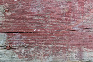 çatlaklar, düğümler ve pürüzlü bir yüzey ile bir tahta şeklinde eski gri-kahverengi doğal ahşap arka plan