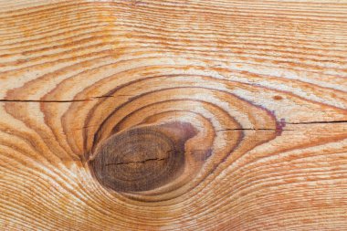 çatlaklar, düğümler ve pürüzlü bir yüzey ile bir tahta şeklinde eski gri-kahverengi doğal ahşap arka plan