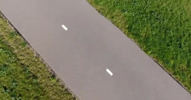 Aerial View Grass Field Bike Route Drone Close Shot — Stock Video