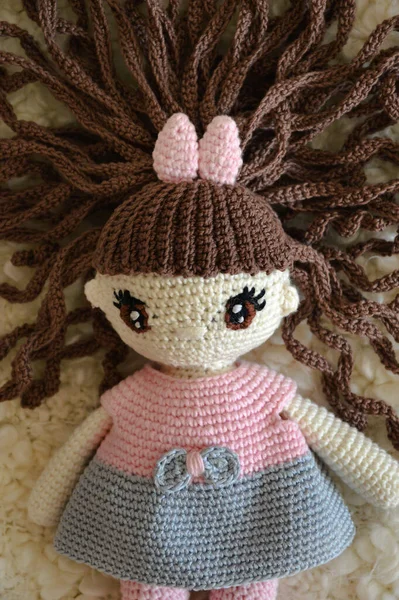 handmade doll. decorative toy. beautiful knitted toy for children. girl. home comfort.