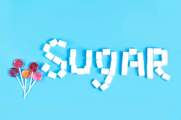 lolipop şeker diş şeker mavi zemin üzerine
