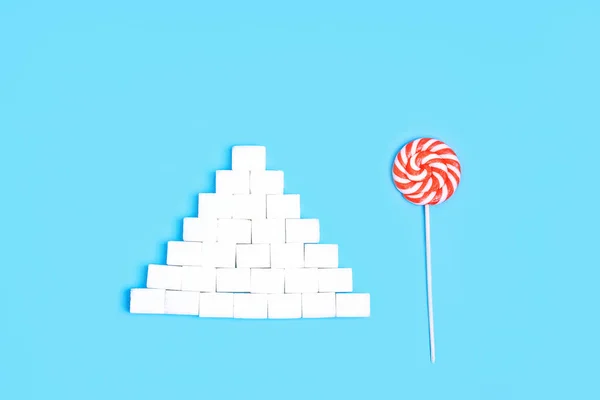 lolipop şeker diş şeker mavi zemin üzerine
