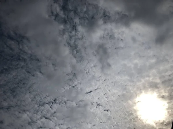 grey sky with clouds, full frame