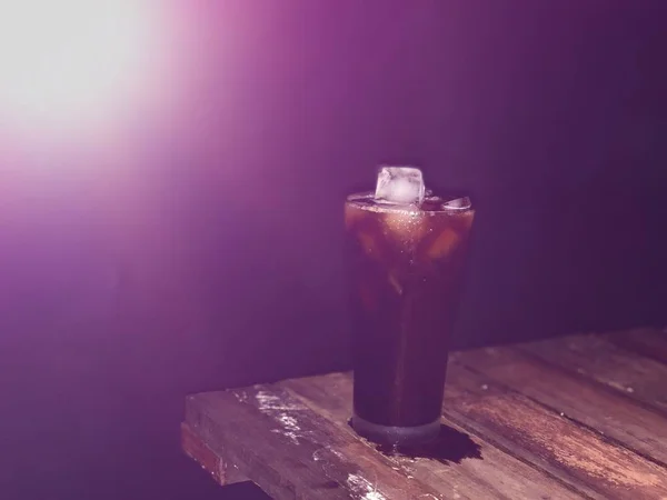 Iced Coffee Glass Blurred Dry Bael Fruit Wood Table Top — Stock Photo, Image