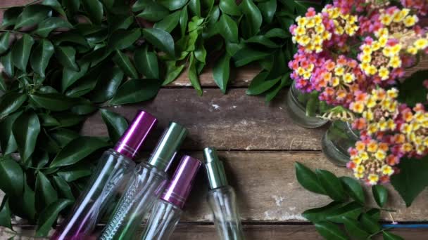 Set Empty Perfume Bottles Wooden Table — Stock Video