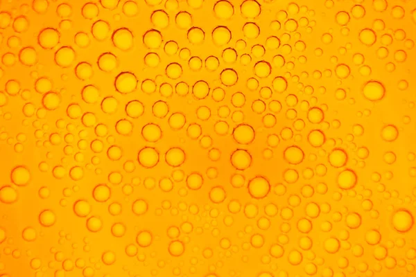 Пузырьки воздуха, окрашенные в жидкие абстрактные цвета — стоковое фото