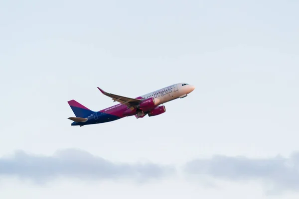Wizz air plane taking off from the airport of  Cluj-Napoca