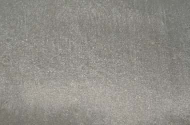 Arka plan ve gri renk ıslak kum doku fotoğrafı.