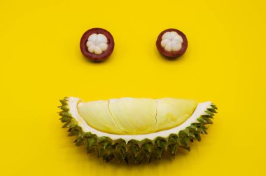 Taze kesilmiş Durian ve mangosten meyve mutlu ifade f ayarla