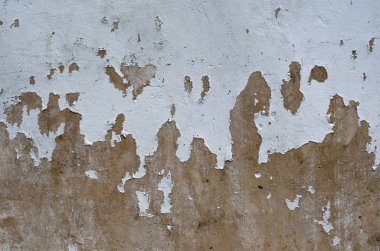 Eski ve beyaz boyama soyulmuş sanat arka plan ve dokulu fotoğraf için kahverengi renk çimento duvar yüzeyinde kırık.