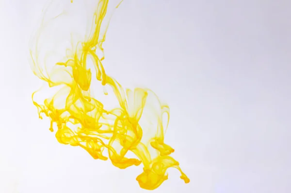 Food color drop and dissolve in water for abstract and background.