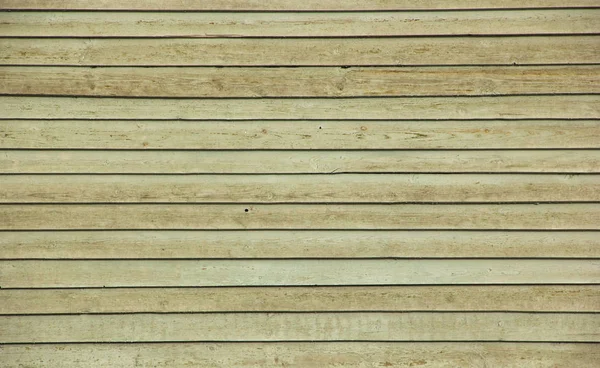           Eski duvar panoları soyulmuş boya sarı kahverengi ile kaplıdır        