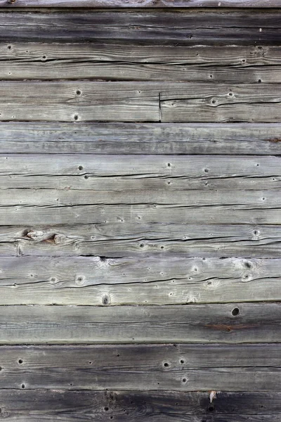 灰色の丸太で作られた木製の壁. — ストック写真