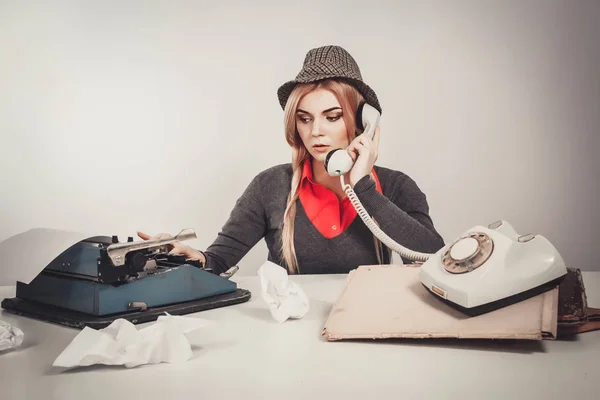 Office, business,detective concept-Beautiful retro business woman vintage secretary talking telephone on gray background