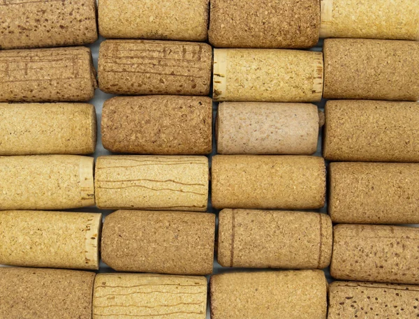 Wall of Wine Corks. Closeup of a wall of wine corks. Horizontal format fills the frame.