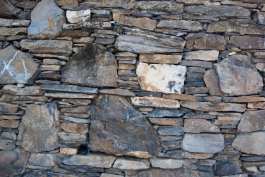 Taş duvar arka plan. İtalya taş duvar çimento olmadan. tarihi binalar 