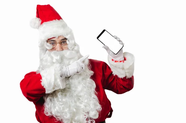 Santa Claus ukazuje chytrý telefon na bílém Blackground s kopií — Stock fotografie