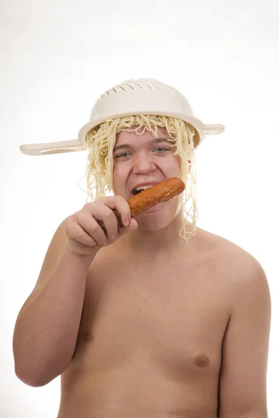Young Fat Cheerful Smiling Boy Eating Sausage Having Colander Spaghetti — Stock Photo, Image