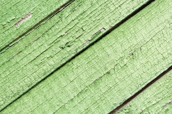 Eski boyanmış tahtalar. Tahtadaki soyulmuş boyanın dokusu