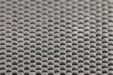 Siyah kauçuk halı. Doku, yumuşak odak.