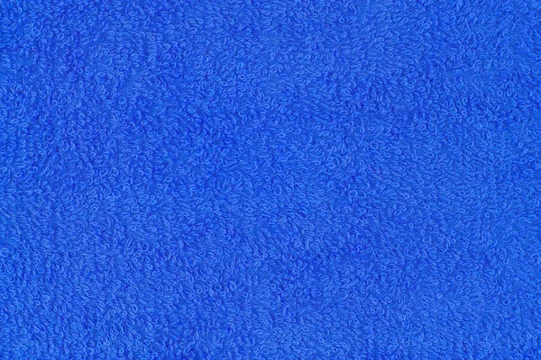 Textura de toalha azul. Fechar-se de um pano terry de toalha . — Fotografia de Stock