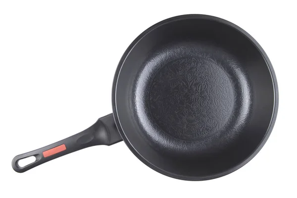 Black frying pan with nonstick surface isolated on white backgro Stock Photo
