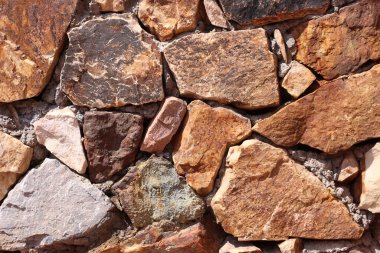 Taş duvarın dokusu. Eski kale taşı duvar dokusu arkaplanı.