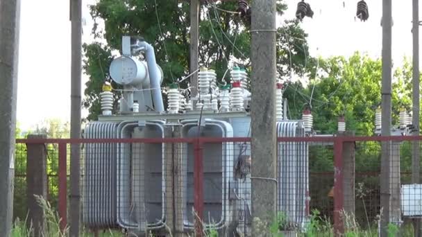 Electrical transformer substation. High voltage transmission power line. — Stock Video