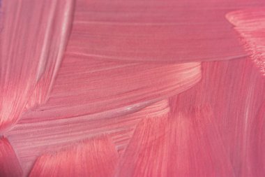 Yağlı boyalı pembe arka plan. Yumuşak pembeye bürünmüş soyut bir arka plan. Pankart ya da işaret için tarafsız yay arkaplanı. El yapımı iş. Fırça darbeleri.