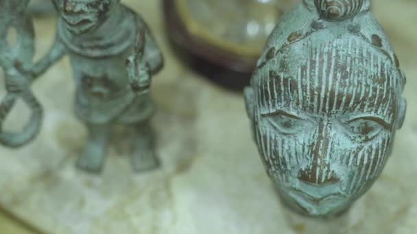 Antique Shop Old Oxidized Copper Figure Mask — Stock Video