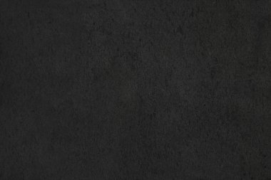 İnsanoğlu kabataslak bir yüzey oluşturmak için birbirine yapışmış beyaz çıkıntıları ve bronzlaşmış arka planı olan malzemeler yaptı.