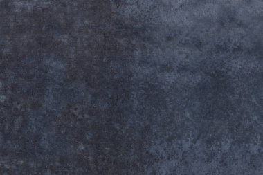 İnsanoğlu kabataslak bir yüzey oluşturmak için birbirine yapışmış beyaz çıkıntıları ve bronzlaşmış arka planı olan malzemeler yaptı.