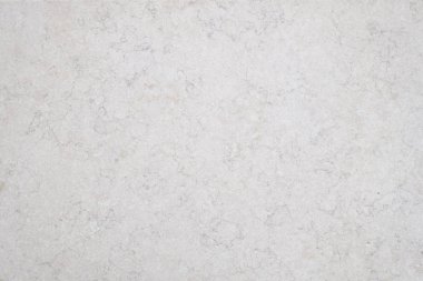 İnsanoğlu kabataslak bir yüzey oluşturmak için birbirine yapışmış beyaz çıkıntıları ve bronzlaşmış arka planı olan malzemeler yaptı.
