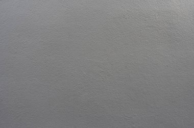 İnsanoğlu kabataslak bir yüzey oluşturmak için birbirine yapışmış beyaz çıkıntıları ve bronzlaşmış arka planı olan malzemeler yaptı.